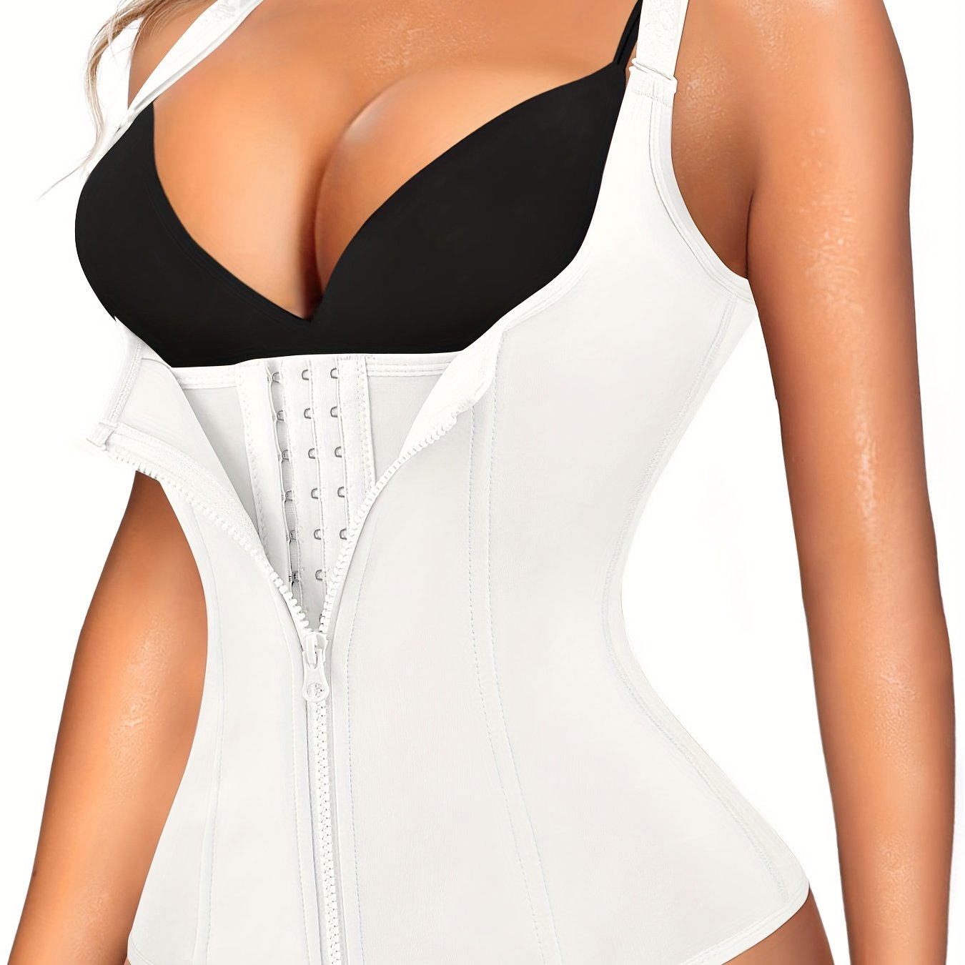 Enhance your curves and define your waistline with Junlan Women's Black Zipper Shaping Cami Top. This waist trainer features tummy control and open bust design for a slimming effect. Made