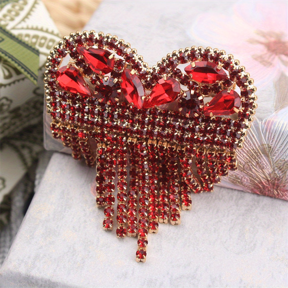 Luxurious Heart-Shaped Rhinestone Brooch Pin with Tassel, featuring an Elegant and Unique Irregular Shape. This Novelty Simulation Modeling accessory is perfect for ladies who want to make a fashion statement. Ideal for parties and also makes a great