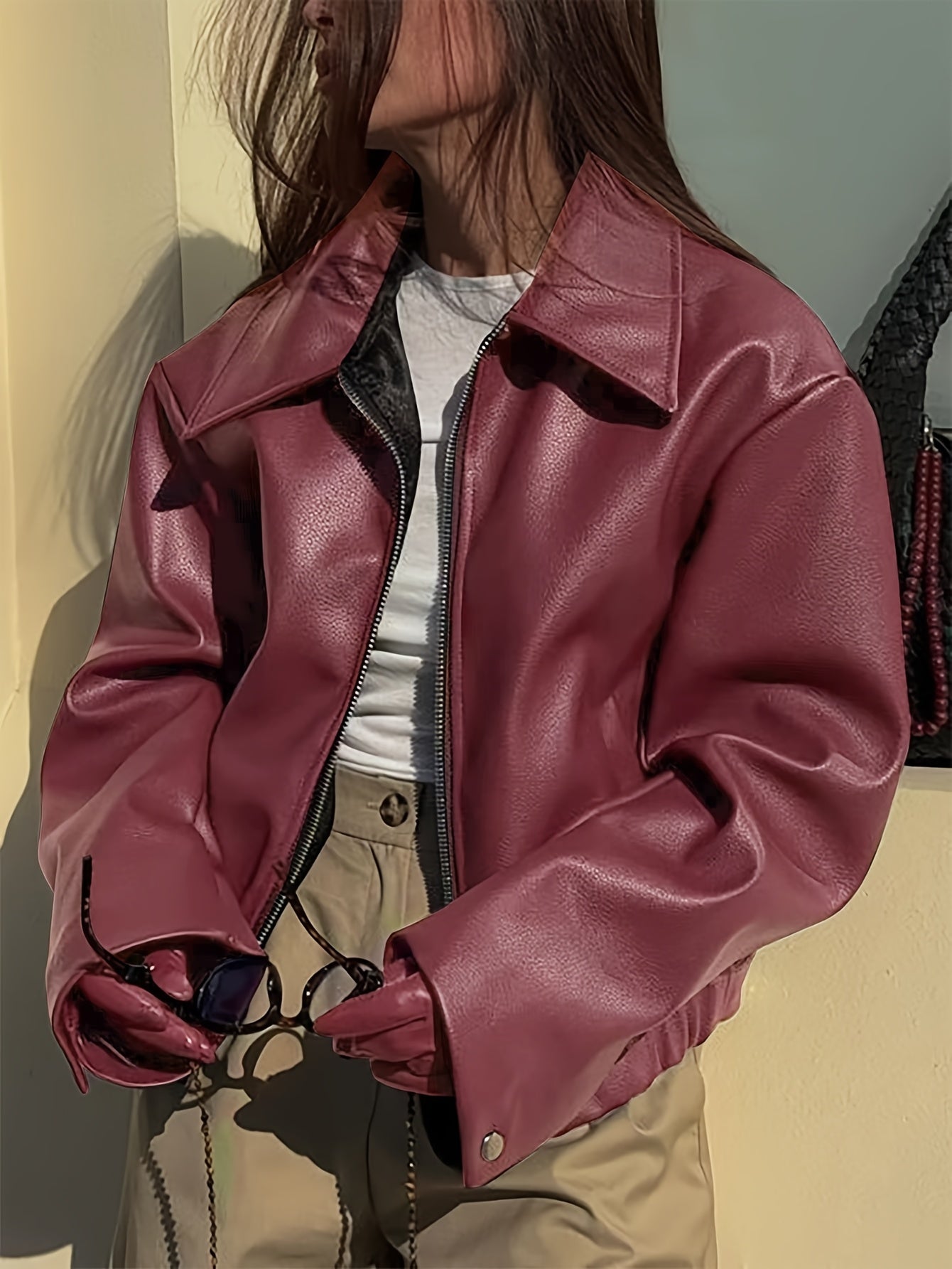 Retro motorcycle PU jacket for women with a stylish and casual design.