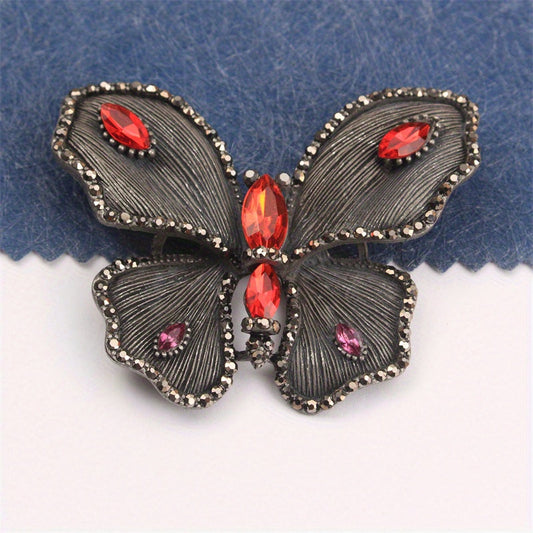 Elevate your style with this stunning Elegant Butterfly Brooch featuring sparkling Rhinestone accents. This unique pin adds a touch of luxury to any outfit, whether it's on clothing, hats, or bags. Perfect for adding a bit of charm and glamour to your