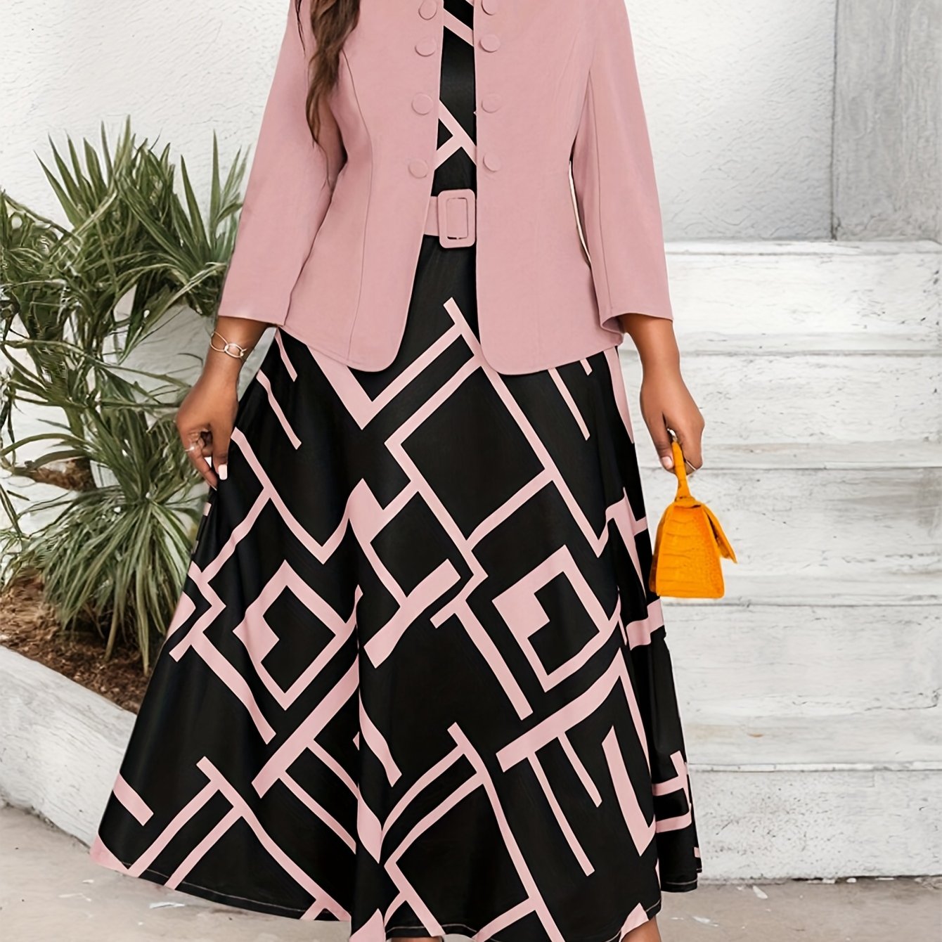 Stylish pink coat and vest dress set for plus-size women that enhances the figure.