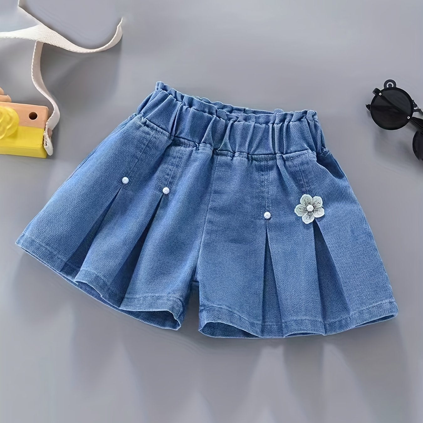 Girls' denim pleated skirt and ruffled shorts for summer, perfect for daily wear or beach holidays with a comfortable and elastic waist.