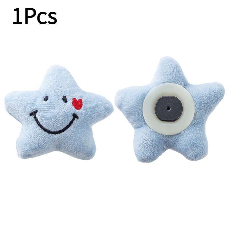 Set of 4 adorable star-shaped quilt and bed skirt fixators made of practical nylon. These anti-run corner holders feature smiling faces and hearts in blue, ensuring secure bedding with their soft plush design.