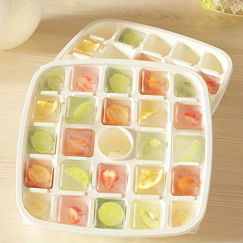 Large capacity, durable, and stackable ice cube tray with easy-release feature. Made of lead-free plastic, this ice cube tray is perfect for home use and can be stacked for convenient storage. Ideal for freezers, this portable ice cube tray is a