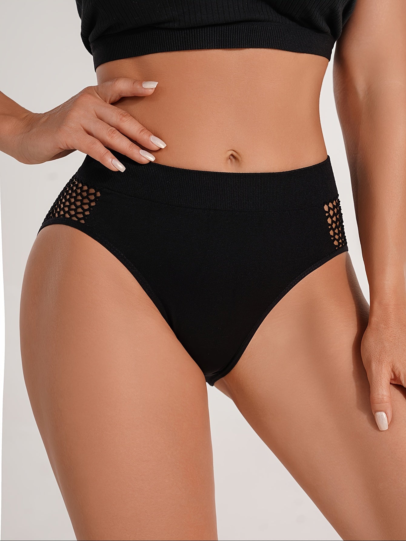 Women's lingerie and undergarments, including solid color sexy panties, mesh spliced low-rise briefs, and simple low-rise triangle pants.