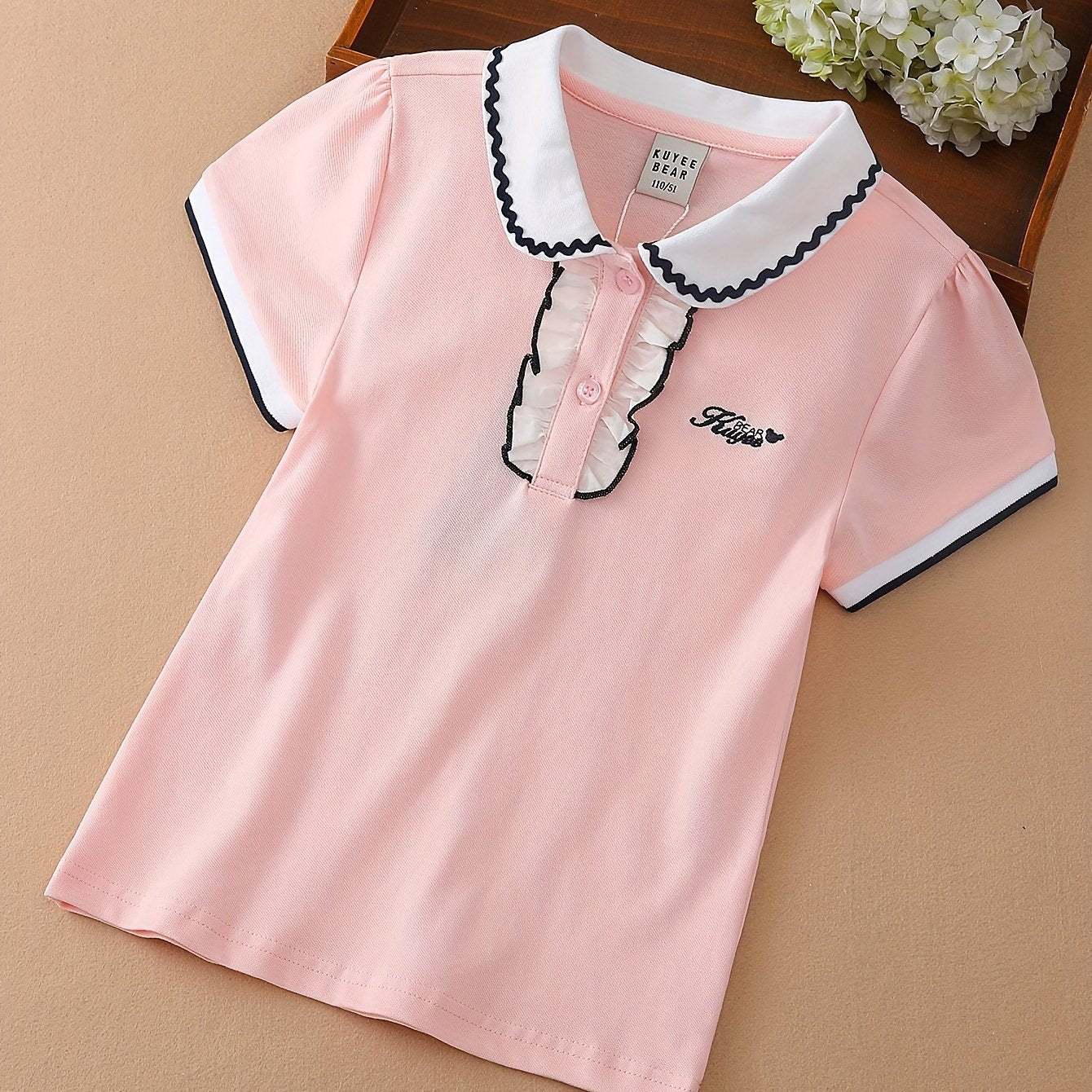 Stylish lace detail on cotton blend girls' shirt - perfect for summer casual wear.