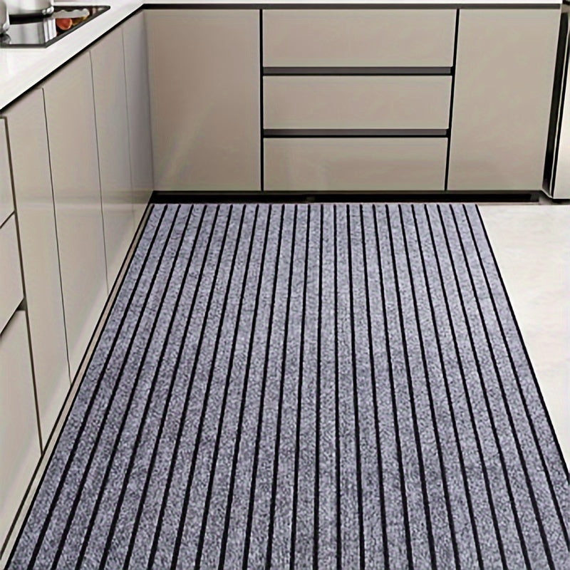 Household mat in gray stripes, designed to prevent slipping and repel dust and stains. Suitable for indoor, kitchen, and bedroom use. Can be cut to size with options available in various dimensions (101.6cm x 152.4cm, 127.0cm x 203.2cm, 114.3cm x 3.05m