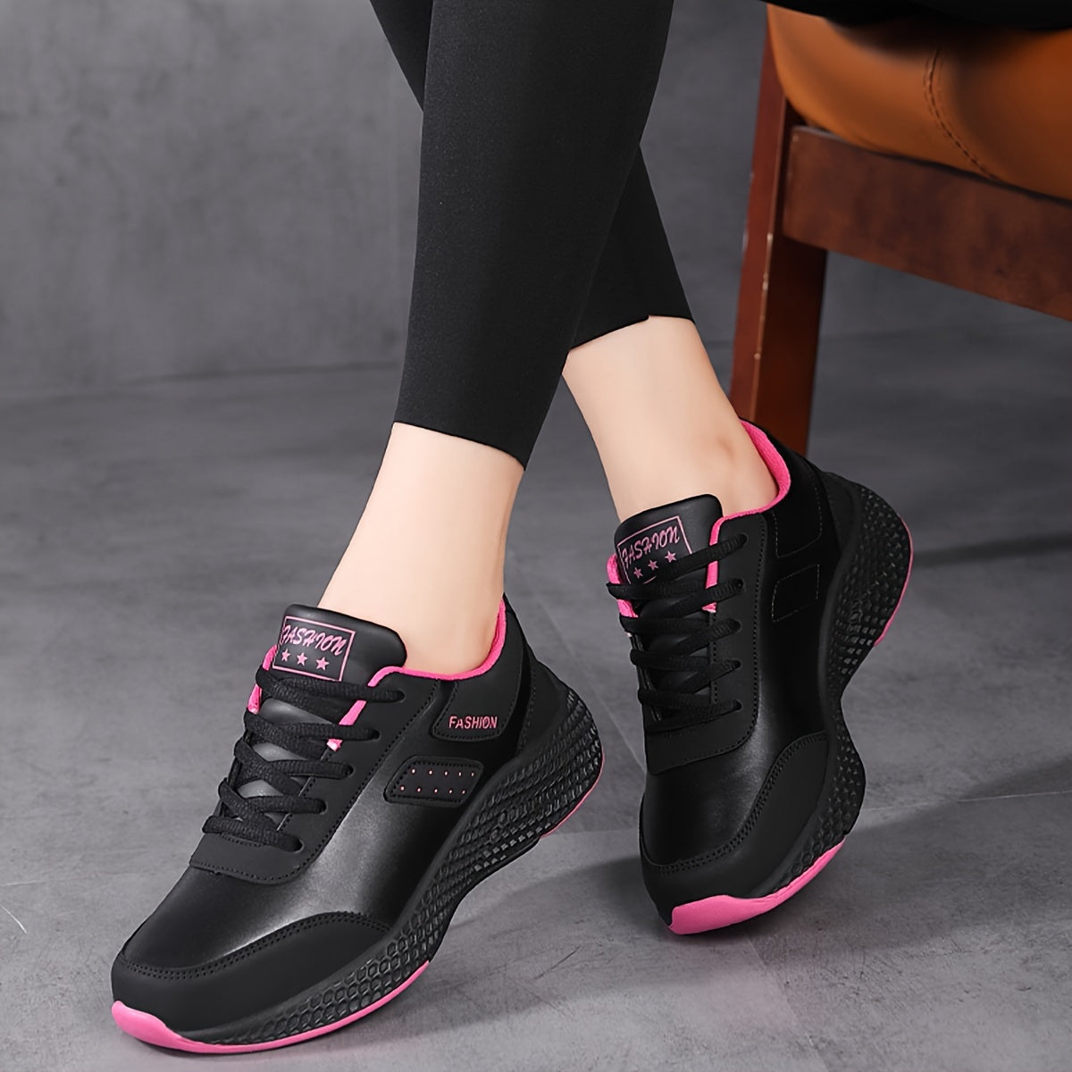 Women's water-resistant running shoes with lace-up closure, solid color, low top design, microfiber upper, fabric inner, and EVA sole.