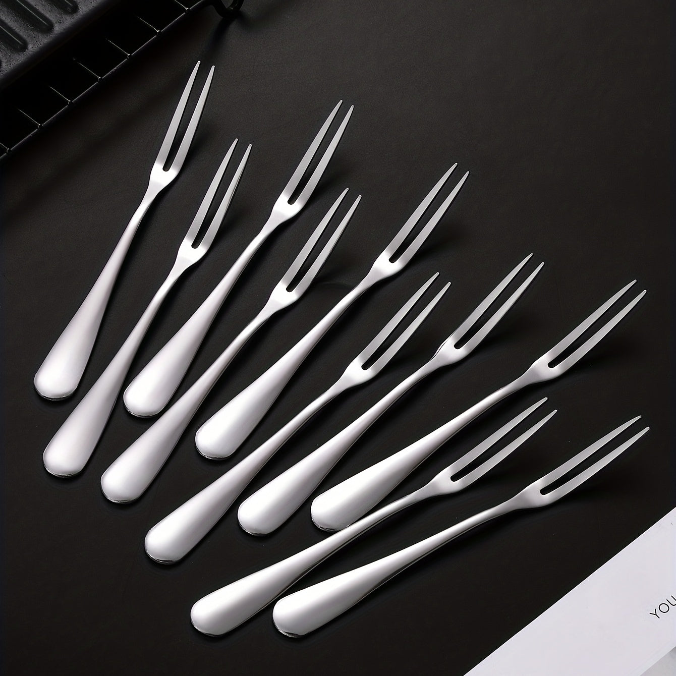 10 stainless steel fruit forks for multiple kitchen uses.