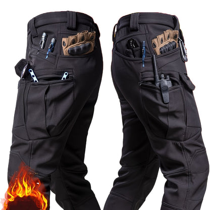 Men's outdoor work pants with pocket design, soft shell fleece lining, mid-rise style, suitable for autumn and winter seasons.