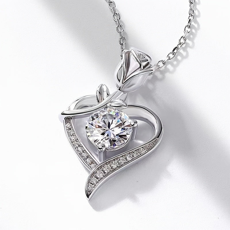 Rose Heart-Shaped Pendant Necklace - Elegant and luxurious necklace featuring a heart-shaped rose pendant adorned with synthetic cubic zirconia. Made with UV plated copper, this versatile piece is suitable for daily wear and gifting. Perfect for Mother's