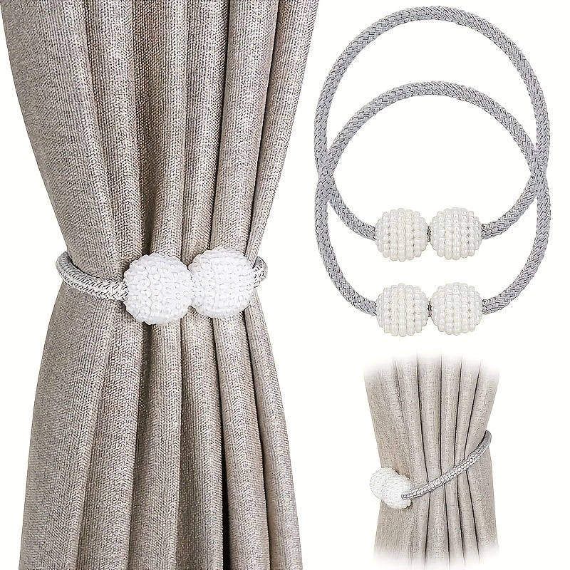 Upgrade your home decor with our Gift 2 Classic Style Magnetic Curtain Ties. Featuring a European design and a strong magnetic braided rope, these ties are perfect for adding a touch of elegance to any room in your home.