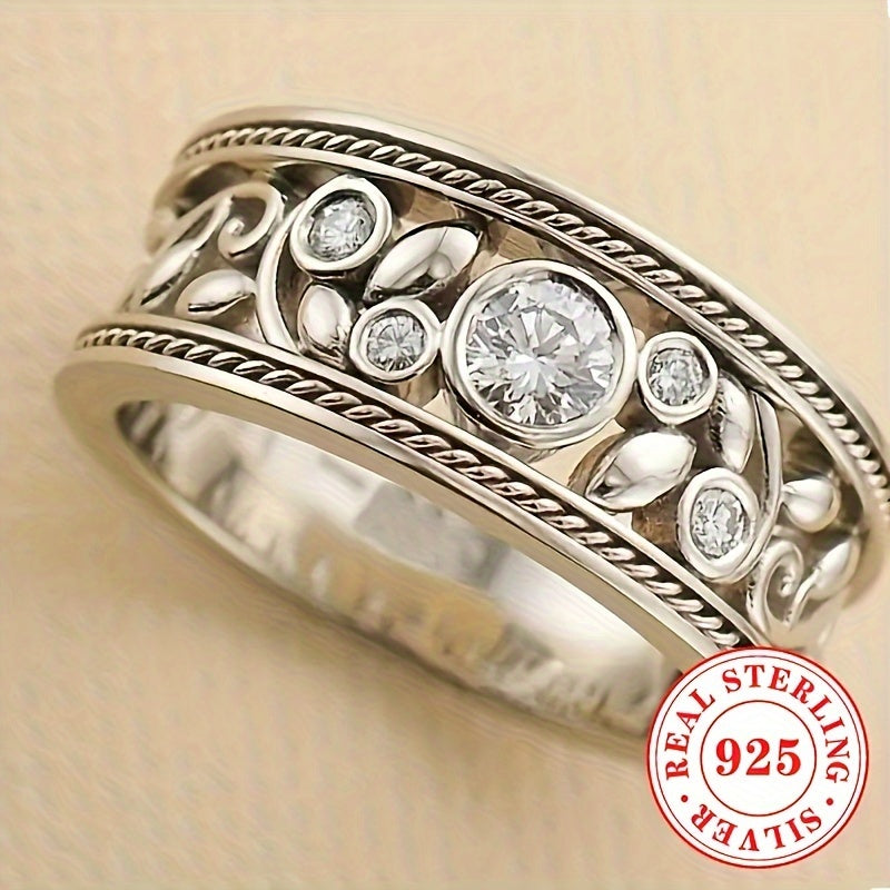 Beautiful silver ring for women, featuring a hollow leaf design with synthetic cubic zirconia stones. Made of 925 sterling silver, this elegant piece is perfect for daily wear and vacations. Ideal for those with an April birthday or anyone who loves