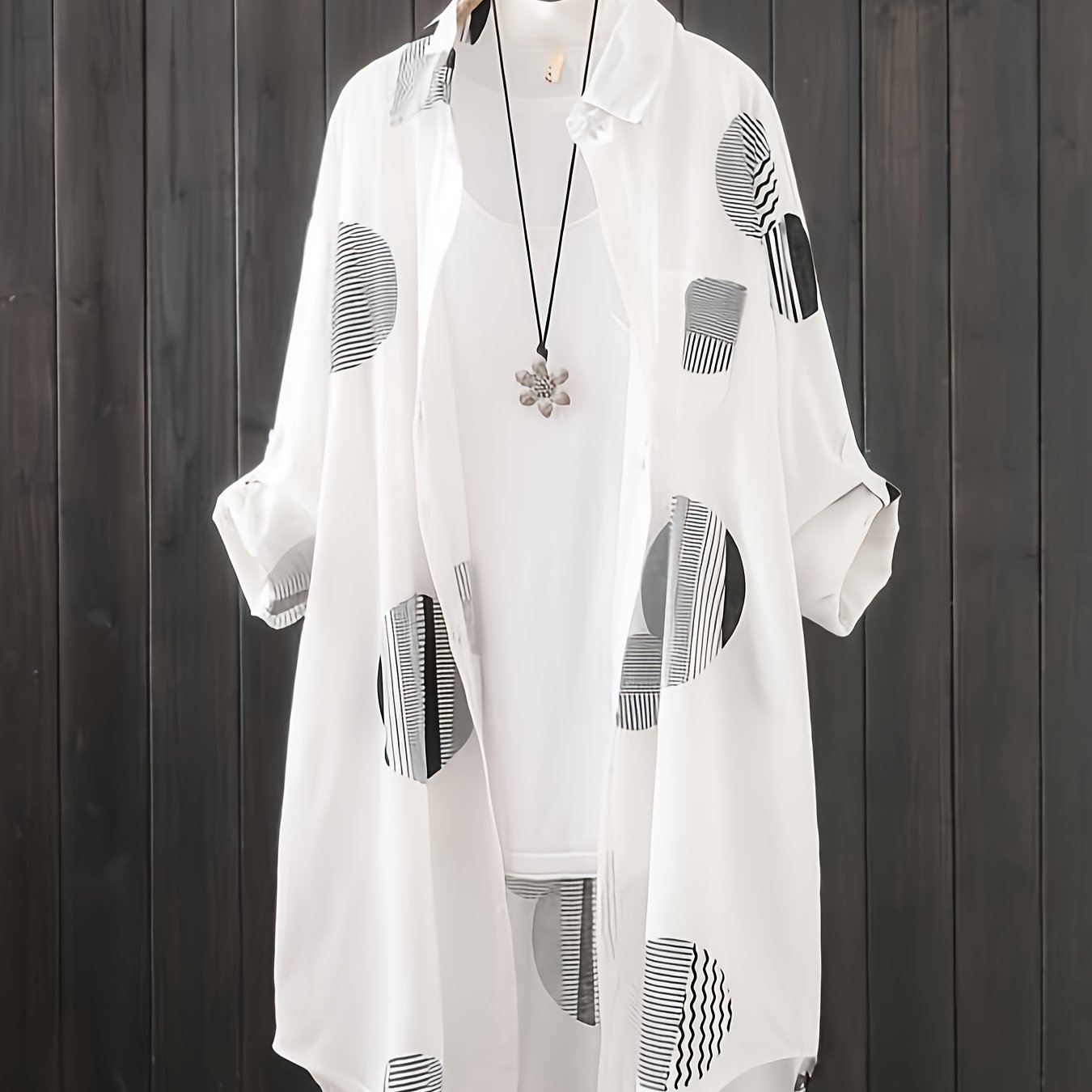 Casual mid-length cardigan shirt for women, loose fit with long sleeves for autumn/winter 2023.