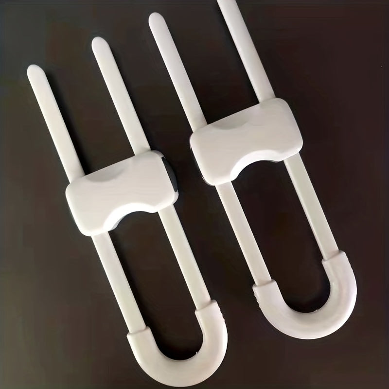 Keep your little ones and furry friends safe with this set of 4 adjustable U-Latch safety locks for sliding cabinets. Made from BPA-free white ABS material, these locks are perfect for kitchens and bathrooms, helping to prevent accidents in danger areas.