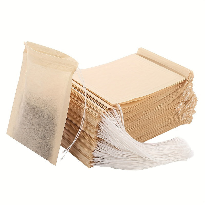 Disposable paper tea filter bags with drawstring, unbleached and safe for loose leaf tea and coffee. These 100pcs tea infuser sachets are made with strong penetration for easy brewing.