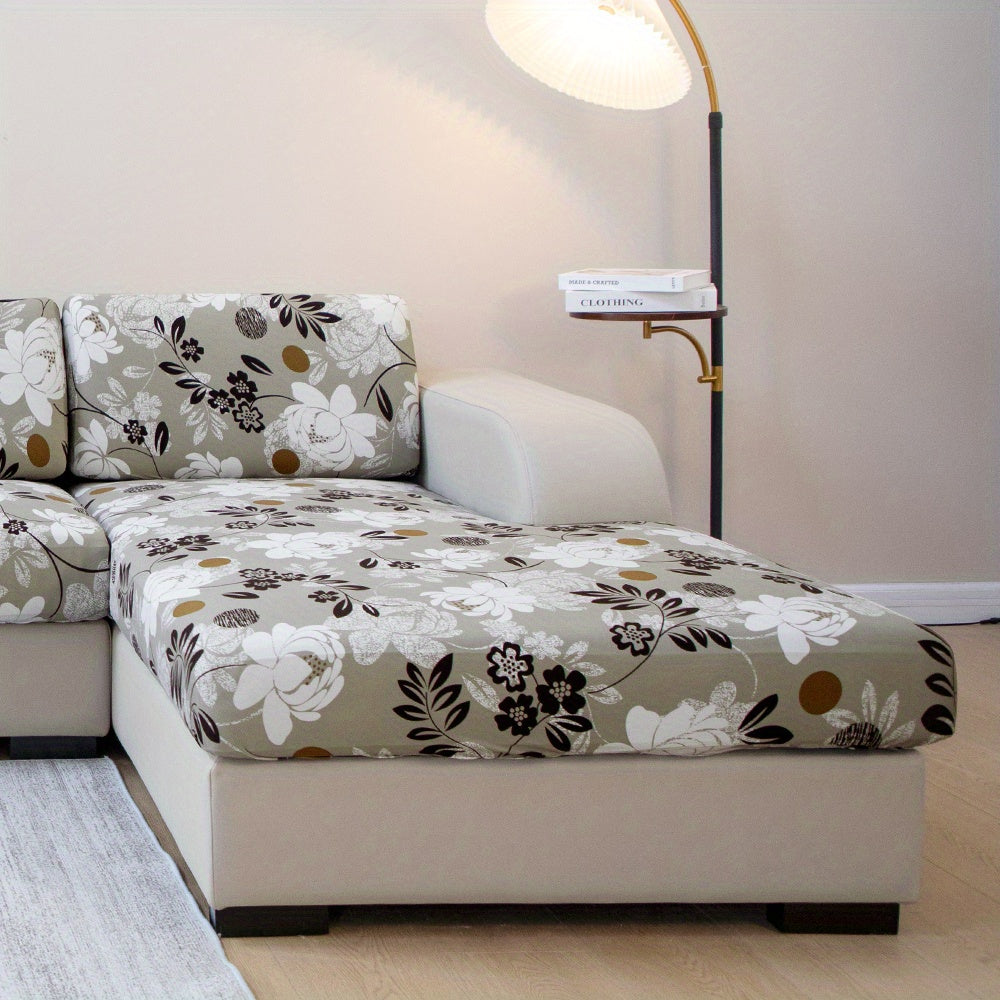 Waterproof flower printed sofa slipcover for furniture protection in various settings.