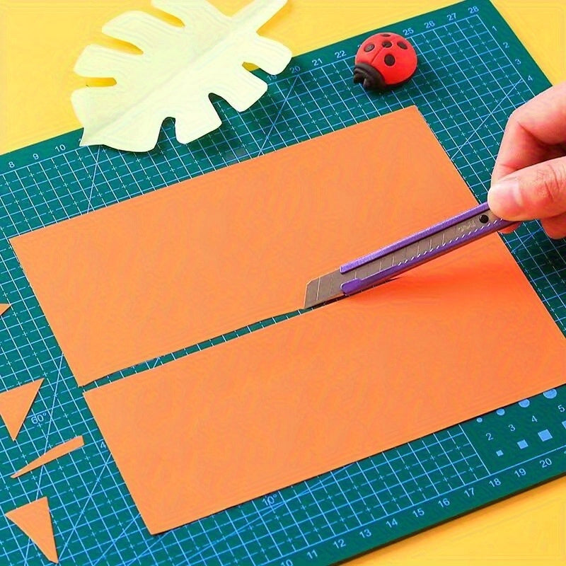 Durable A3 cutting mat for quilting and sewing, featuring a high-precision non-slip surface for fabric, paper, and crafting projects. Ideal for crafters and hobbyists.