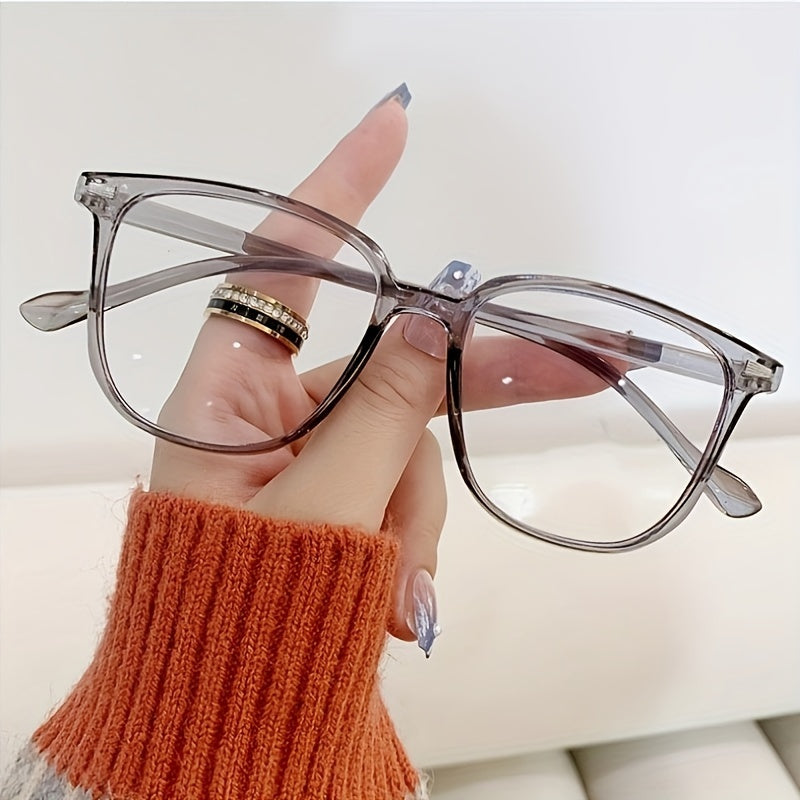 Stylish PC frame glasses with clear polycarbonate lens and gradient design, perfect for everyday wear for both men and women.