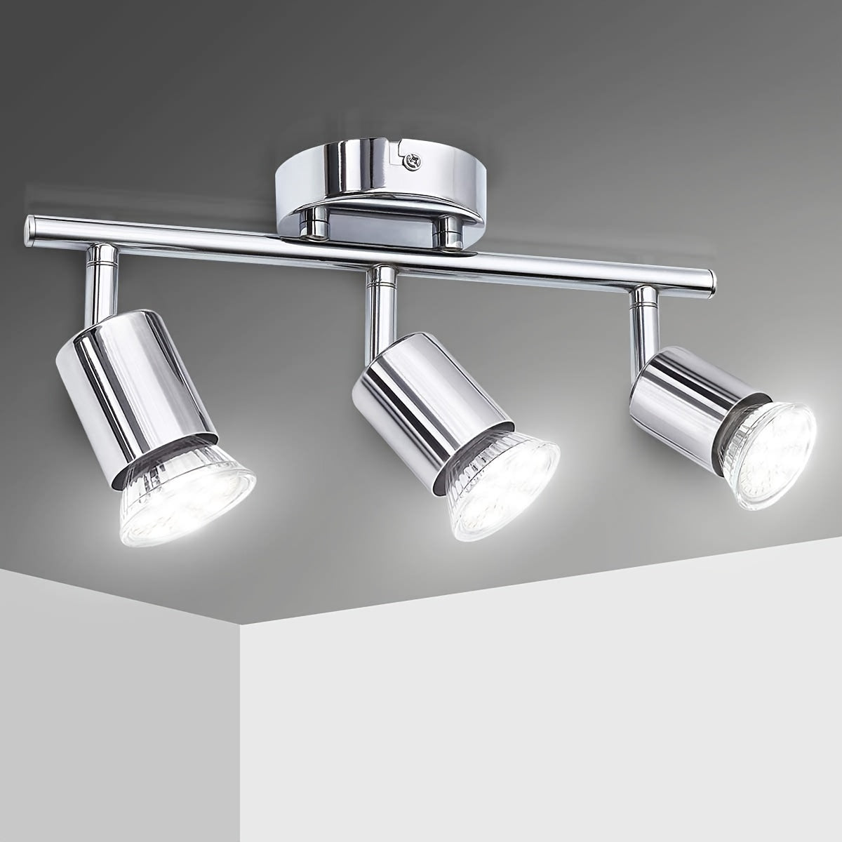 1pc 3-light track lighting in chrome with rotatable head and GU10 LED bulbs, suitable for indoor use in living rooms, hallways, and studios. Bulb not included.