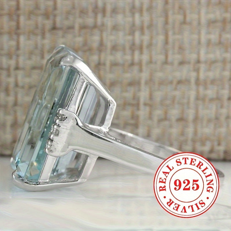 Simple yet elegant, this classic 1 Lady Anniversary Ring features a 5.4g S925 Sterling Silver band with a 4 prong-set square Aquamarine synthetic gemstone. Perfect for everyday casual wear or special occasions like weddings, banquets, and parties, this