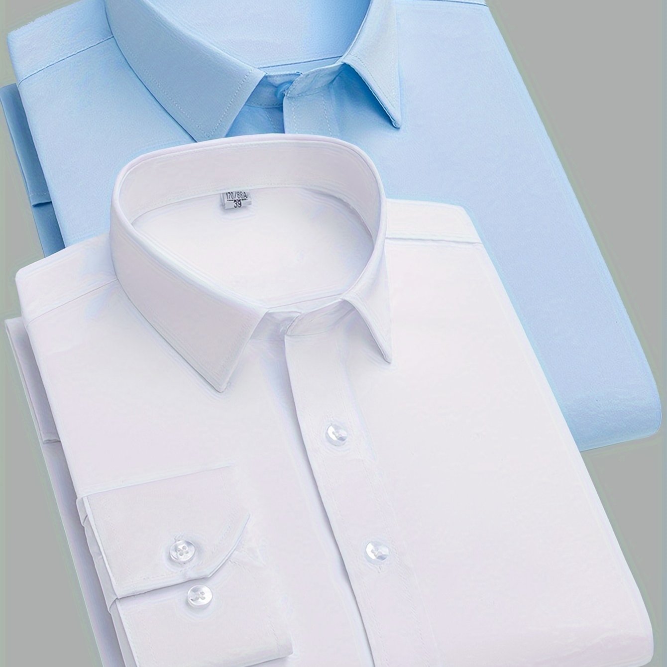 2 Men's work style polyester dress shirts in solid colors, regular fit with button details and lapel collar.