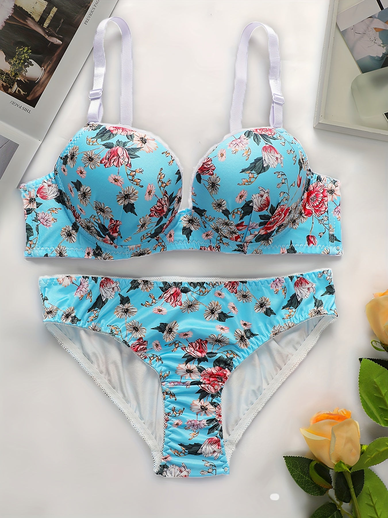 Blue floral lingerie set includes padded underwire bra and panty for a sexy summer look.