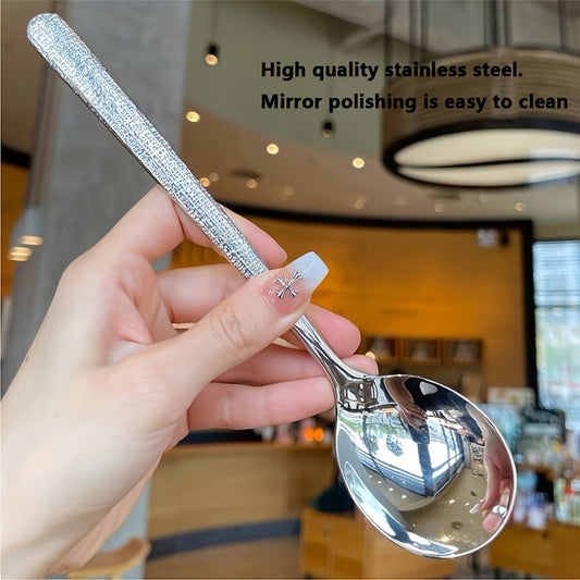 Durable stainless steel spoon with hammered round head design - ideal for kitchen and restaurant use. Easy to clean with a mirror polished finish. Suitable for soups, rice, and desserts.