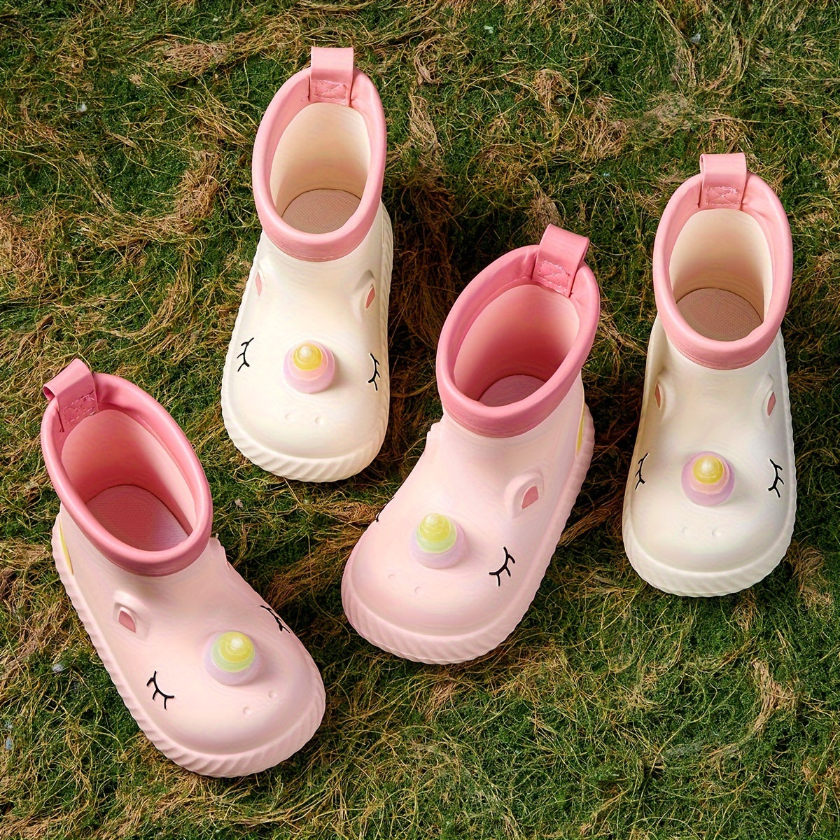 Waterproof Unicorn Cartoon Rain Boots for girls in Pink & White, ideal for outdoor play and school in fall/winter. Made from comfortable EVA material with non-slip soles.