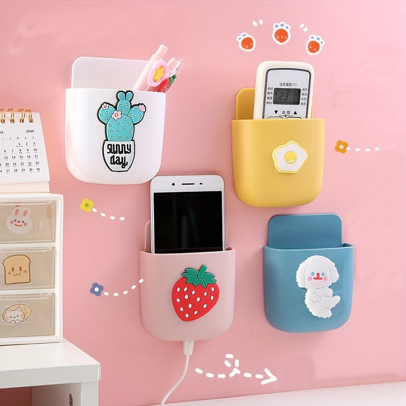 Multifunctional wall-mounted storage box for mobile phones, remotes, and charging cables. Self-adhesive and punch-free. Ideal for home decor and desk organization.