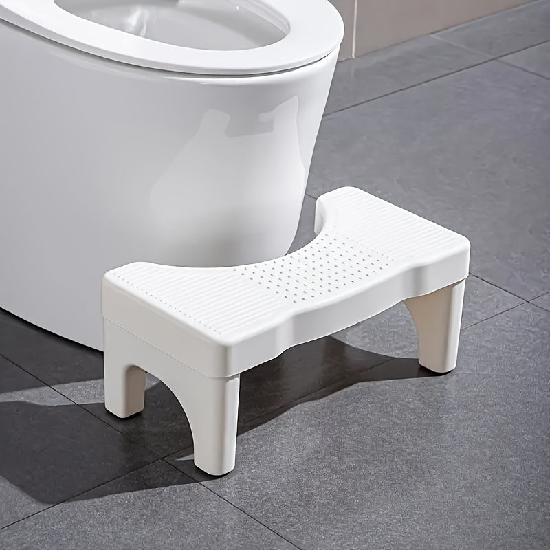 1pc Ergonomic Folding Toilet Step Stool with Durable Plastic Construction and Space-Saving Design, featuring Anti-Slip Feet and a 35-Degree Comfort Angle for Essential Bathroom Aid.