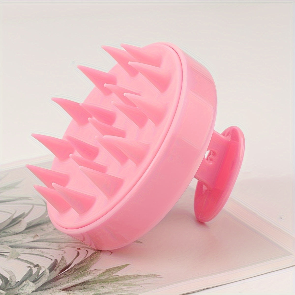 Silicone hair washing brush with plastic massage comb for hair washing and hairdressing.