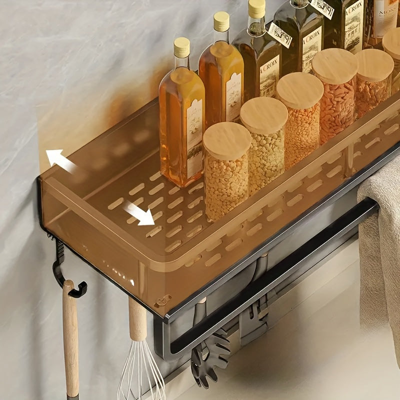 Metal storage for bathroom toiletries that does not require drilling, featuring a spice rack, utensil holder, and towel bar, all in one wall-mounted kitchen organizer.