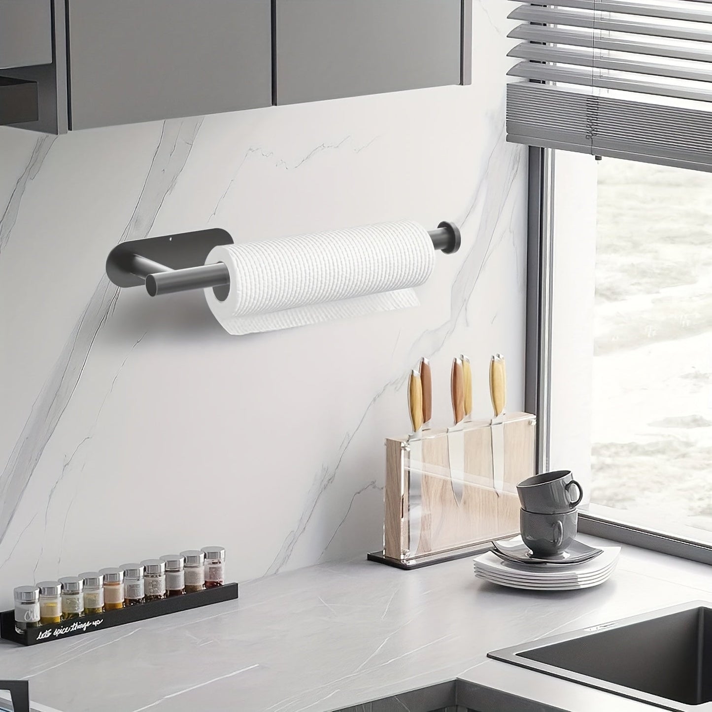 This versatile paper towel holder is made of durable stainless steel and can be easily mounted on the wall in your kitchen or bathroom. It offers the choice of either self-adhesive or drilling installation under your cabinet, providing a convenient