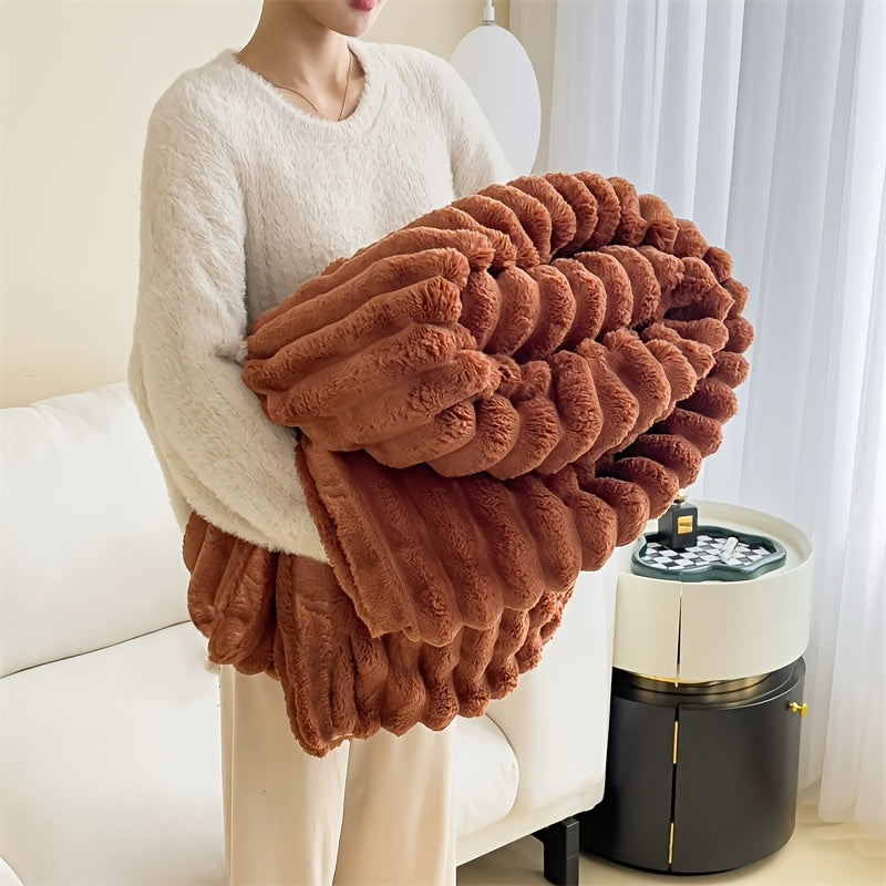 Indulge in the comfort of our luxurious plush blanket - a cozy fleece throw that will keep you warm and snuggled up on the sofa. This soft and insulating blanket is not only perfect for lounging, but also machine washable for easy care. Its modern style