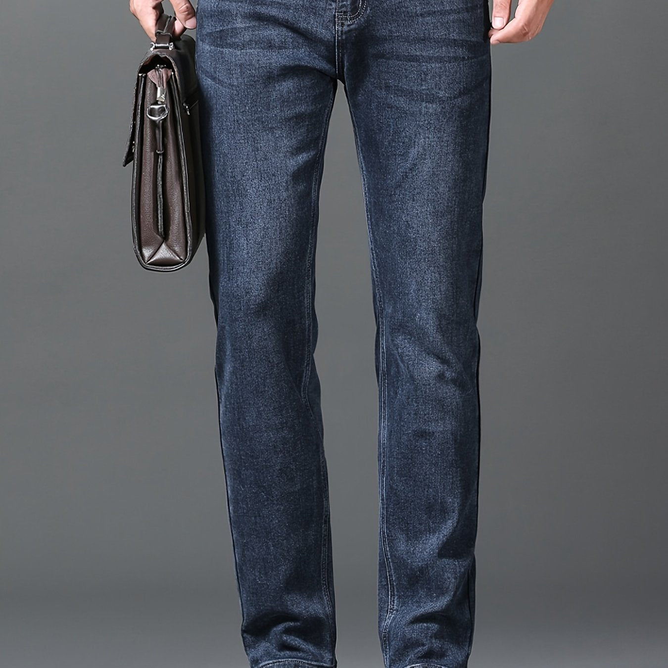 Men's semi-formal stretch denim pants with classic straight leg design and pockets, ideal for fall and winter.