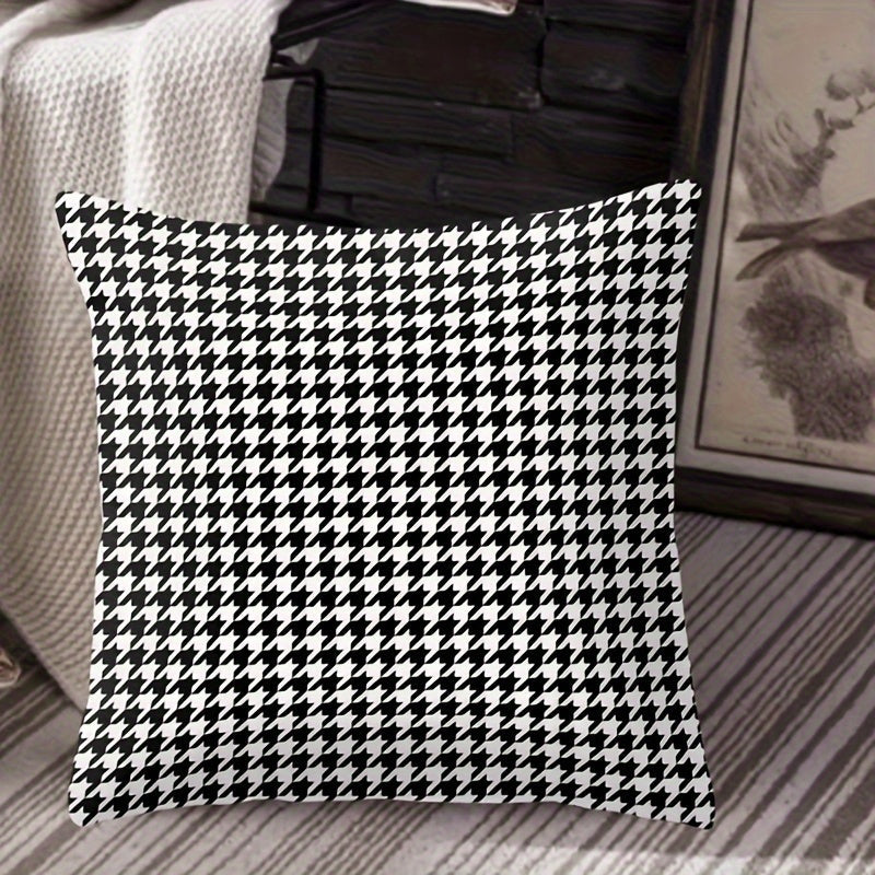 This stylish houndstooth throw pillow cover features a chic design, measuring 44.96cm square. The double-sided print is made of soft polyester and includes a convenient zip closure. Perfect for adding a touch of elegance to your living room or bedroom