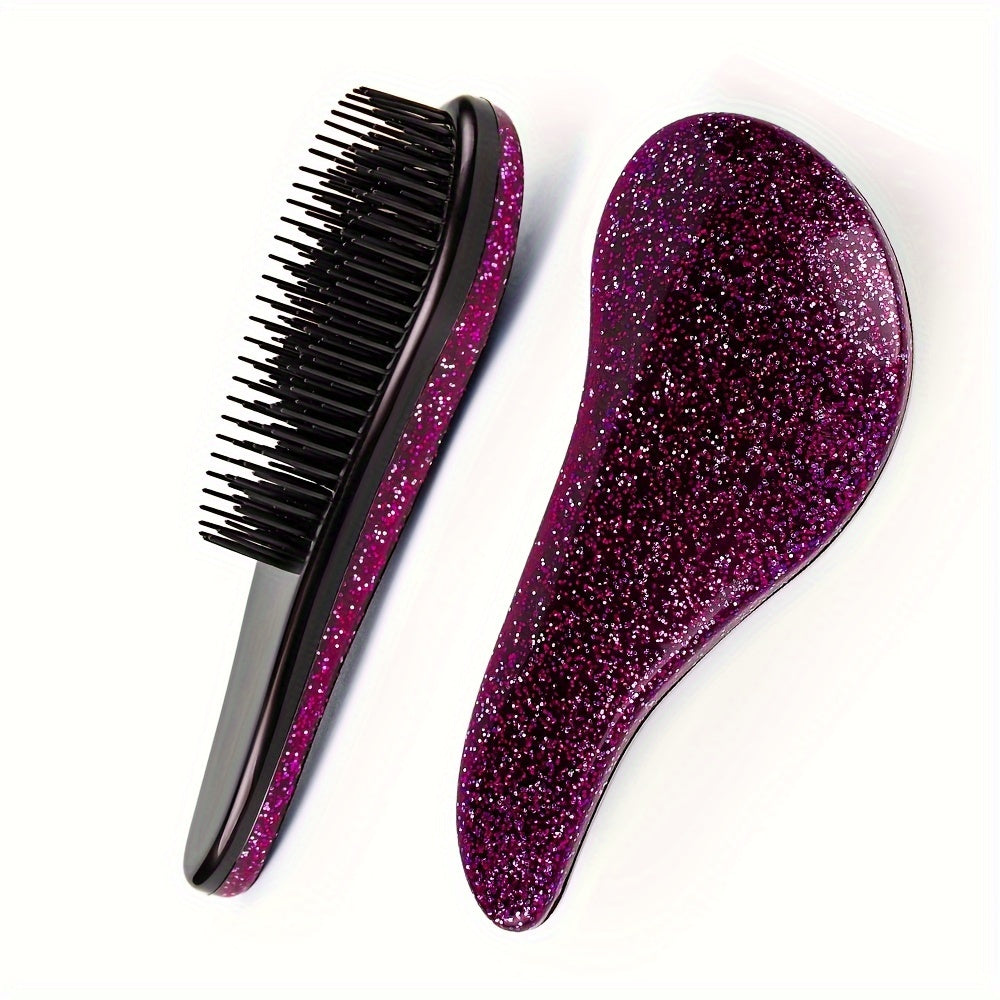 Portable, tiny massage comb for detangling hair with a starry sky design.