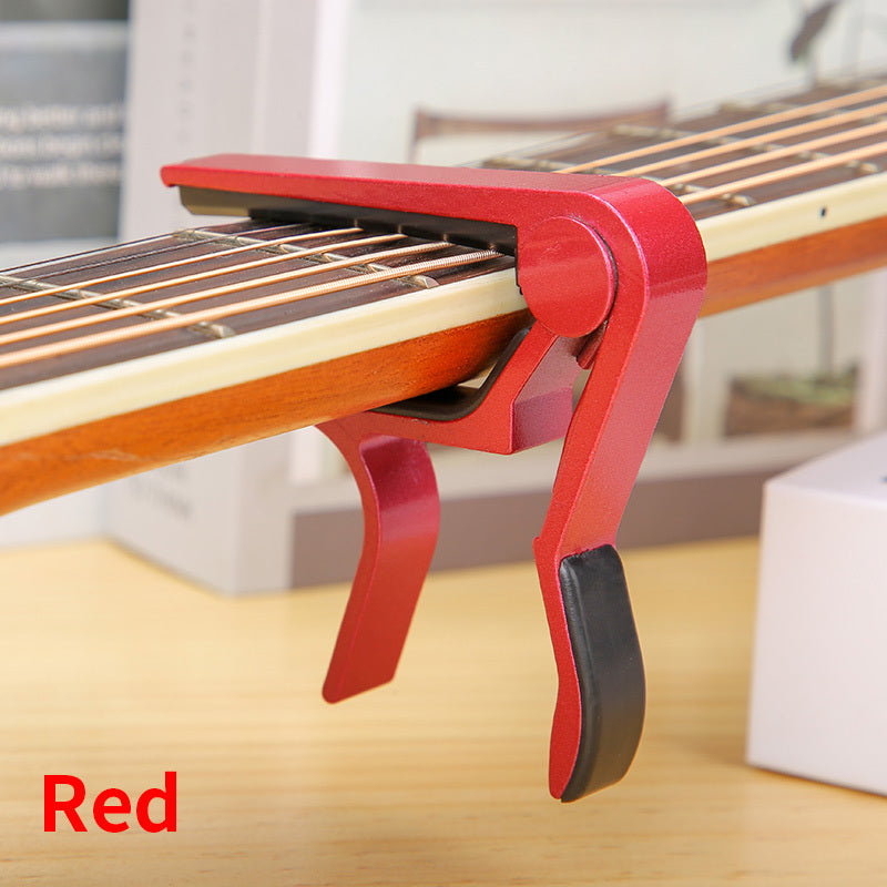 Aluminum alloy guitar capo for acoustic, classical, electric guitars and ukuleles, quick change with tone adjustment.