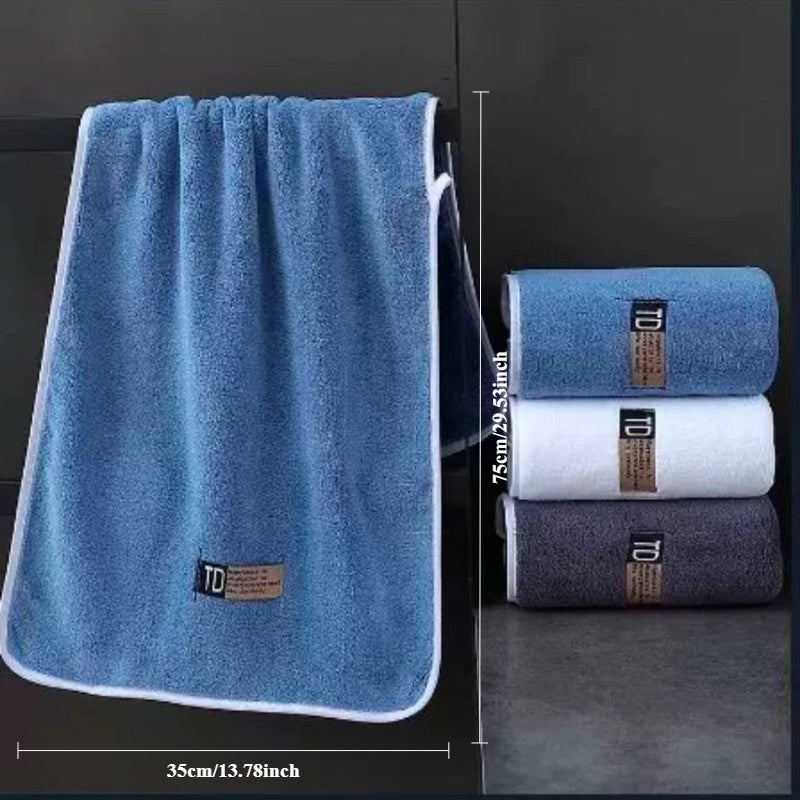 Set of 3 large microfiber bathroom face towels in blue, white, and dark teal with "D" label. Ultra-soft, super absorbent, quick-dry, low-lint, and five-star hotel grade.