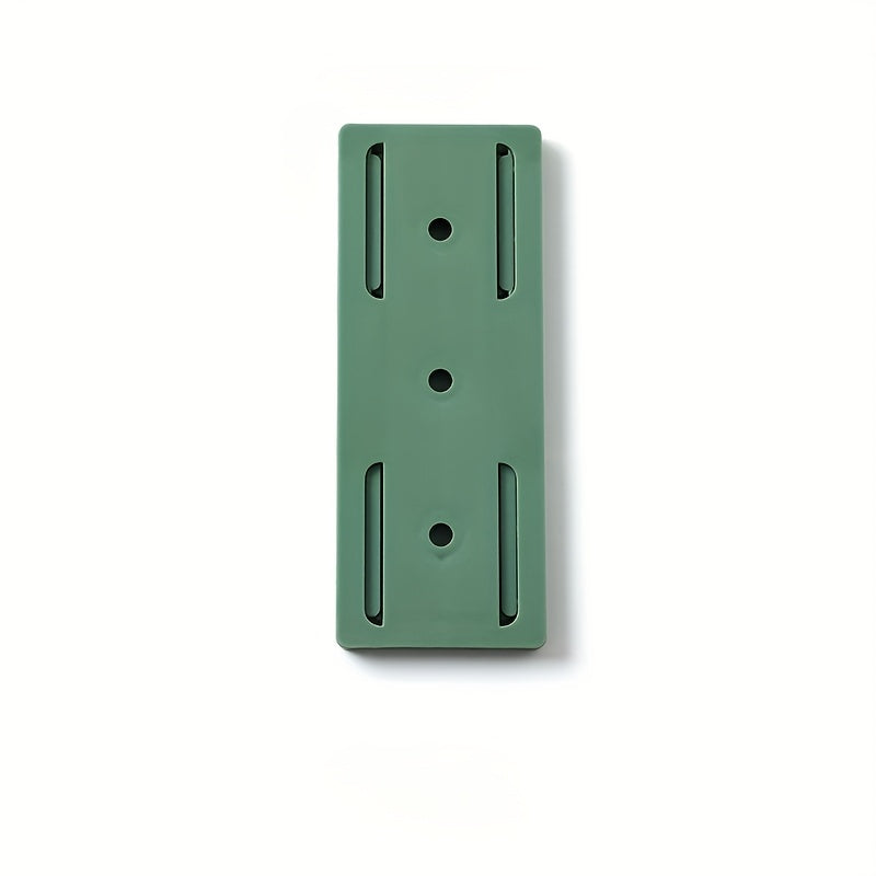 Wall-mounted storage for sockets with adhesive backing, suitable for various rooms and spaces such as living rooms, bedrooms, offices, bookshelves, and storage boxes. This socket holder requires no punching and leaves no trace when removed.