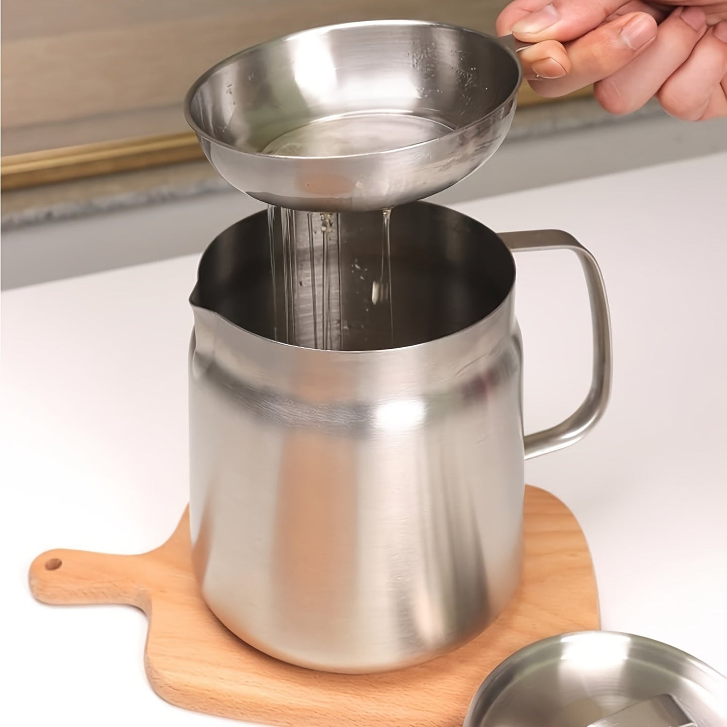 Get your hands on this Oil Pot made from 304 Stainless Steel that comes with a Drainer Basket. With a Large Capacity and a Multipurpose design, it is ideal for storing Grease, Cooking Oil, and more. The Non-Leakage and Drip-Free design make it perfect