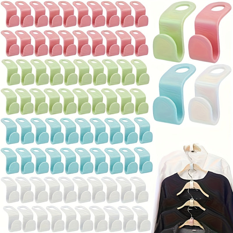 50 foldable plastic hanger hooks for wall-mounted wardrobe storage, in various colors. Casual style hangers for clothes rack.