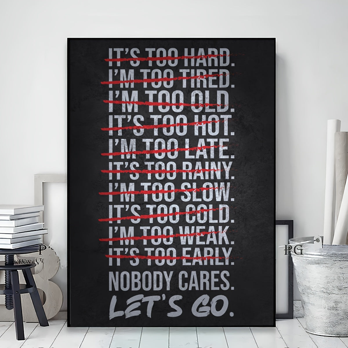 Modern minimalist gym motivational poster in black and white with bold red text "IT's TOO HARD NOT to CARE, LET's GO." Frameless canvas wall art for home office, living room, and bedroom decor.