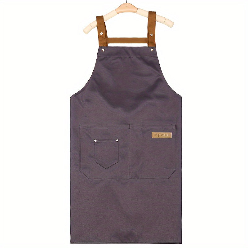 Unisex canvas apron with pockets, adjustable strap, ideal for coffee shops, restaurants, kitchens, and various other professions. Made of durable 240G/M² woven fabric with a protective