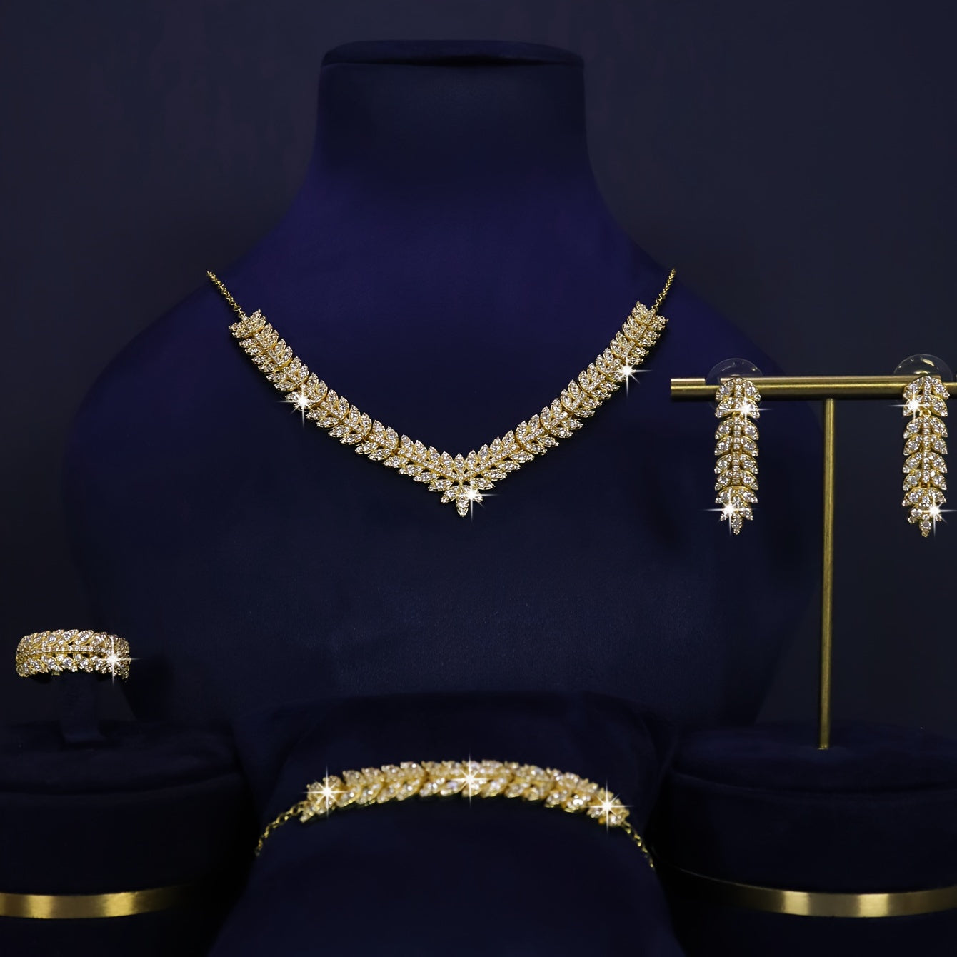 Stunning 5-piece V-Shaped Jewelry Set in Gold Plating for Women - Featuring Necklace, Earrings, Bracelet, and Ring adorned with Shimmering Zirconia - Ideal for Weddings and Special Occasions