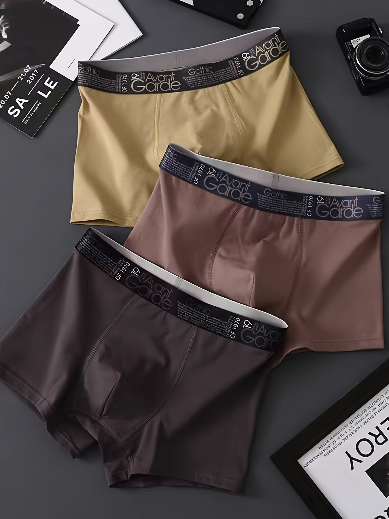 Men's boxer briefs in random colors, comfortable, breathable, stylish for young male students, mid-rise with simple letter design.