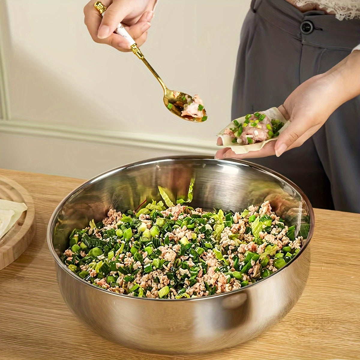 A practical kitchen set with a stainless steel basin, a spacious kneading bowl, a versatile vegetable washing basin, and a soup pot.