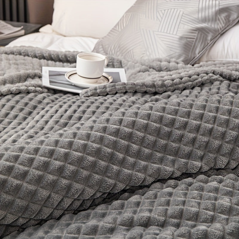 Soft and comfortable waffle plush blanket, made of milk velvet, perfect for use in the bedroom, sofa, office, car, camping, and travel. This multifunctional blanket comes in white, gray, green, brown, and silvery gray solid colors and checkered pattern.