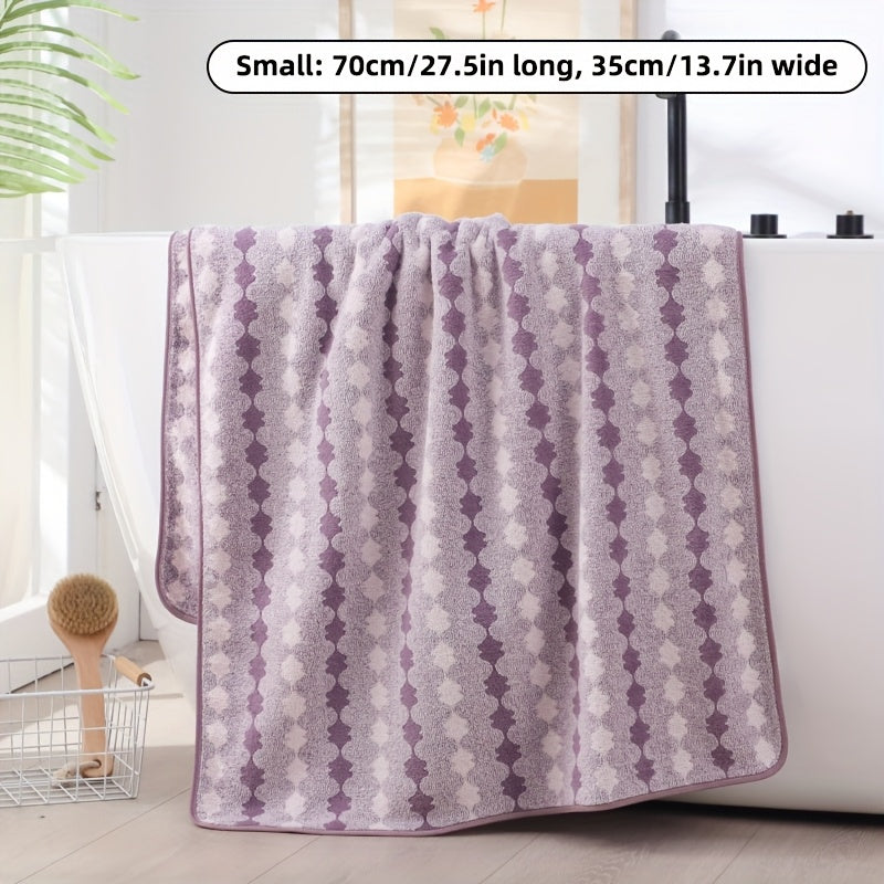 One set of extra large and small bath towels for women made of super soft, absorbent coral velvet with a modern design and strong absorbency.